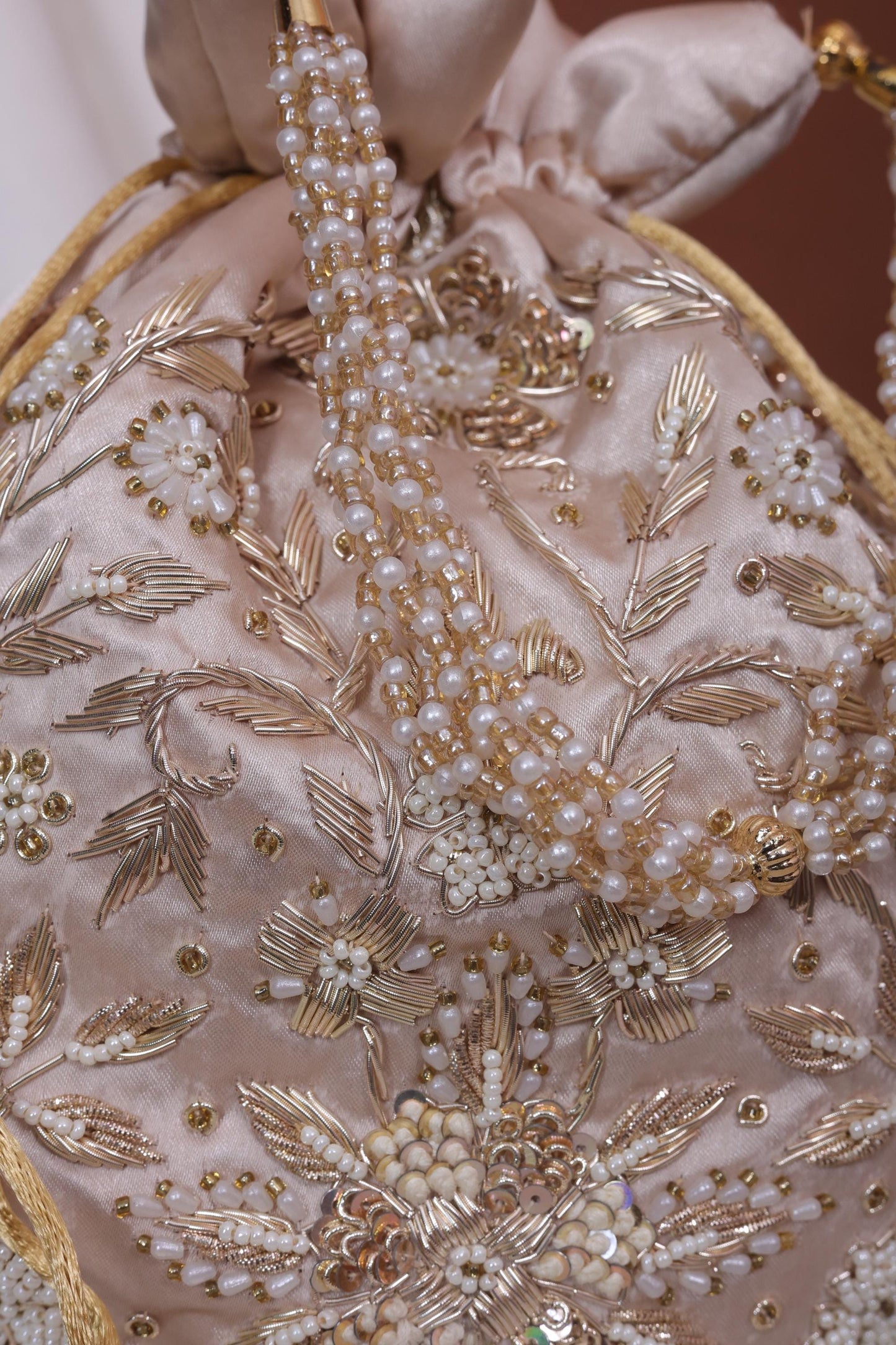 Champagne Gold Pearl Handle Embroidered Potli Bag
