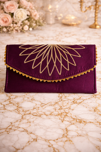 Purple clutch with gold embroidery