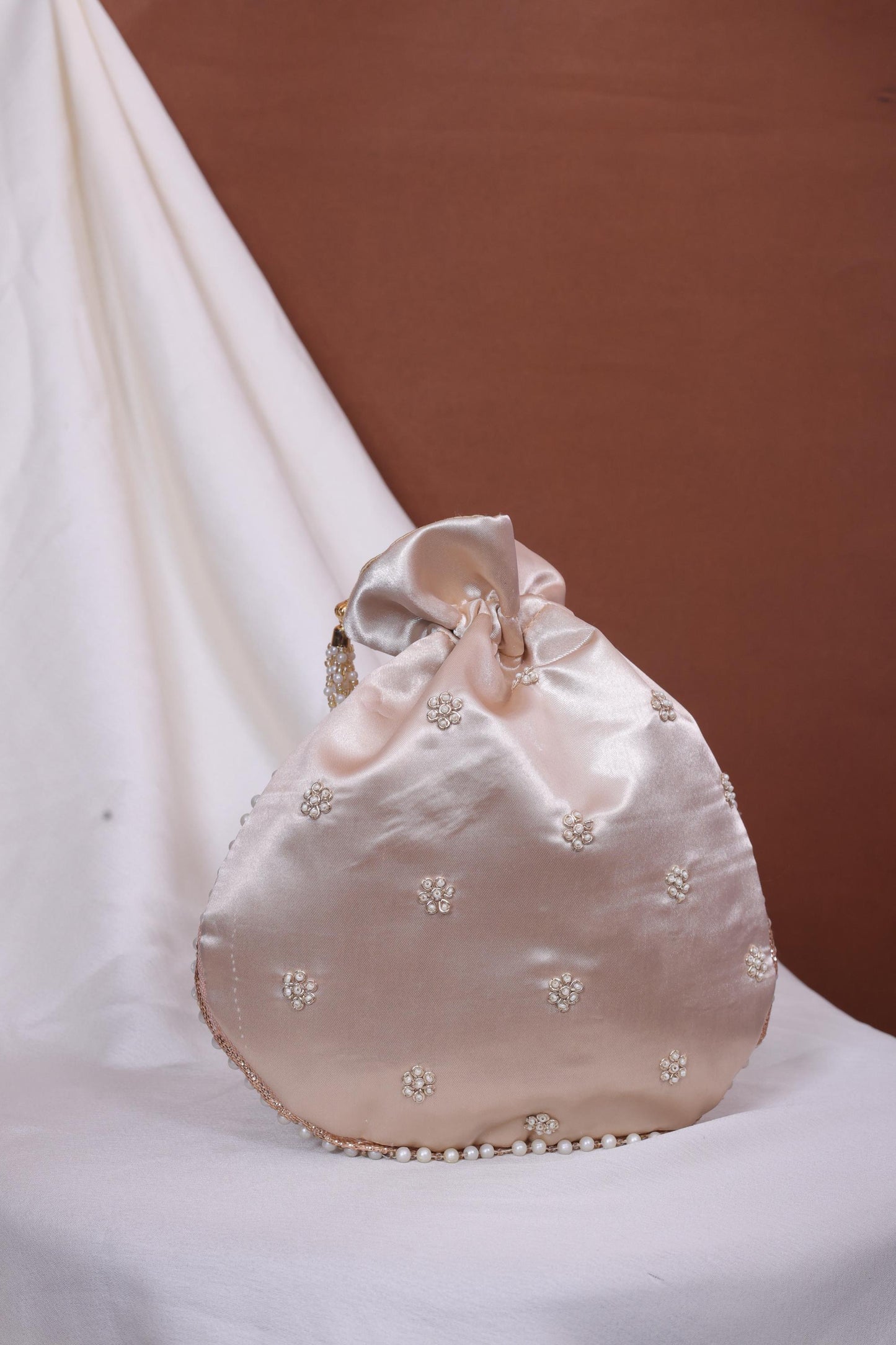 Champagne Gold Pearl Handle Embroidered Potli Bag