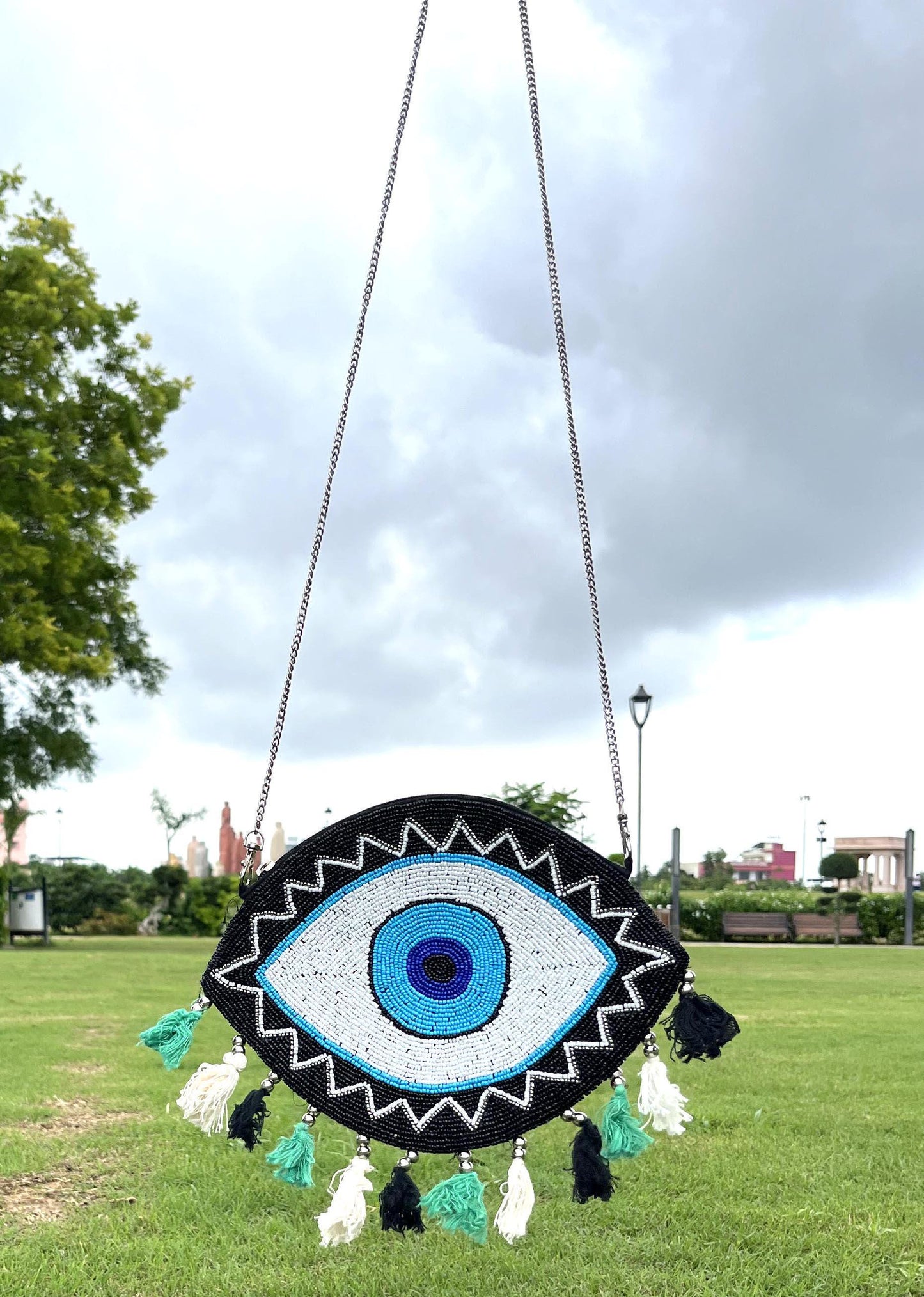 Handcrafted Beaded Evil Eye Bag: Boho Clutch with Colorful Tassels